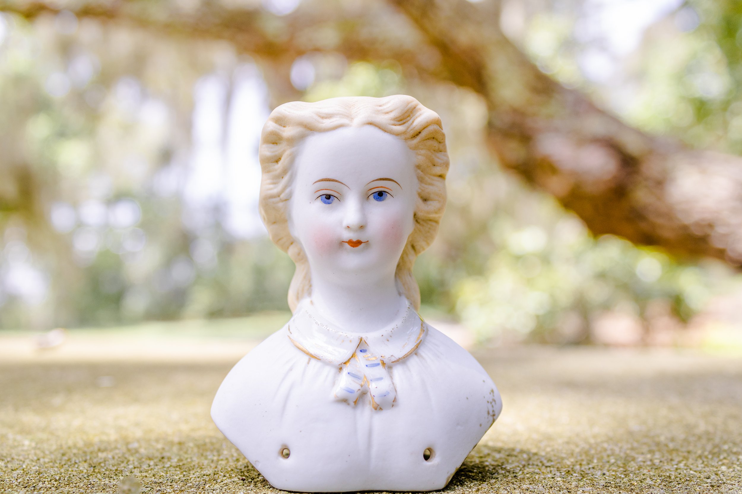 Antique Parian doll head by C. F. Kling with snood hairstyle