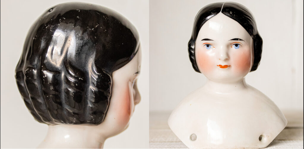 an antique German porcelain doll from the 1850s by Kister with the covered wagon hairstyle